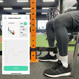 Physiotherapist assessing patient’s hamstring strength using Fitmust device in seated position