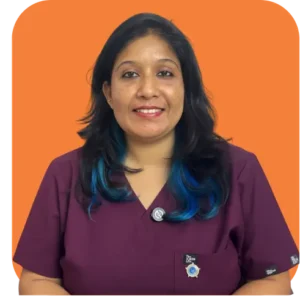 Abhivyakti Navgeet, MPT (Sports Physiotherapy), Head of Physiotherapy at Amicare Hospital and Founder of Rehab Insights, wearing maroon scrubs in a professional portrait with an orange background.
