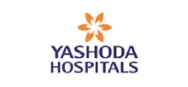 Yashoda Hospitals logo featuring a stylized orange flower icon above the brand name in blue text, representing clinical excellence and healthcare partnership.
